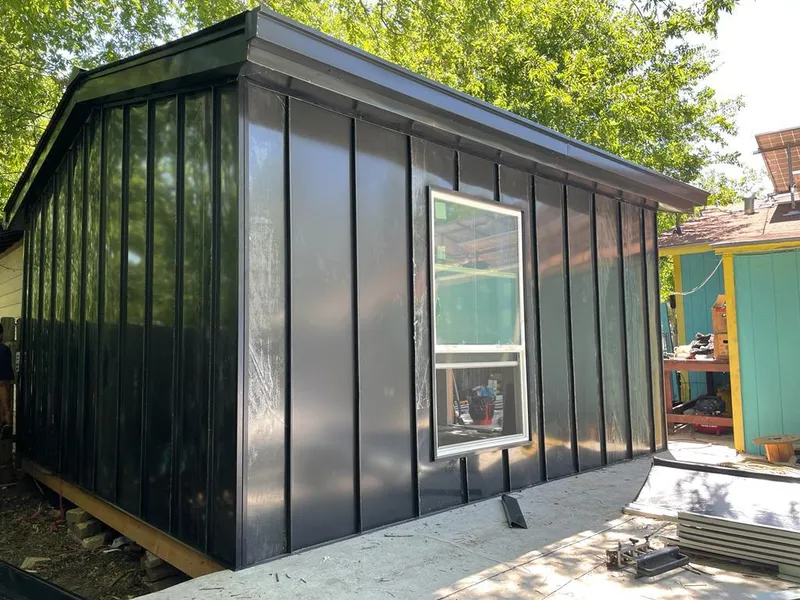 Black standing seam metal wall panels for Roof Inspection in East Pennsboro